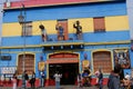 Famous figurines, such as Evita Peron and Maradona made from fiberglass on balconies in the colorful area of La Boca, Buenos