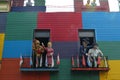 Famous figurines, such as Evita Peron and Maradona made from fiberglass on balconies in the colorful area of La Boca, Buenos Aires