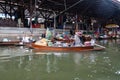 Famous floating market in Thailand, Damnoen Saduak floating market, tourists visiting by boat, Ratchaburi, Thailand Royalty Free Stock Photo