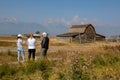 Famous Florida artist, with her assistants, renders her depiction of the John Moulton Barn