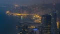 The famous view of Hong Kong from Victoria Peak night to day timelapse. Taken before sunrise with colorful clouds over Royalty Free Stock Photo