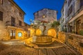 Famous fountain at dusk in Saint Paul de Vence, France Royalty Free Stock Photo