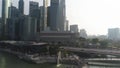 Famous fountain statue in Merlion Park and cityscape of Singapore. Shot. The Merlion fountain spouts water in Singapore. Royalty Free Stock Photo