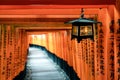 Famous Fushimi Inari-Taisha Shrine. High depth of field with an ornate lantern as the primary subject of this