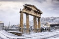 The famous Gate of Athena Archegetis, Athens, with thick snow during winter time
