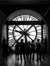 Famous glass clock in the dark room of Musee d Orsay in Paris