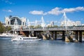 Golden Jubilee Bridge with boat in London, England, UK