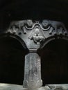 Graven cats above two arcs of the monastery of Geghard in Armenia.