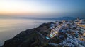 The Famous greek iconic of sunset view tourist destination Oia village  in the night with traditional white houses and windmills Royalty Free Stock Photo