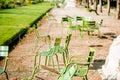 Green chairs at Tuileries gardens in Paris