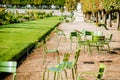 Green chairs at Tuileries gardens in Paris