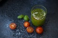 The famous green pesto sauce made from Basil, pine nuts, Parmesan and olive oil in a glass glass. Royalty Free Stock Photo