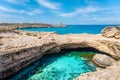 The famous Grotta della Poesia, cave with turquoise water in Puglia, Italy Royalty Free Stock Photo