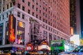 Famous Hard Rock Cafe Restaurant and Shop in Times Square, New York. Neo Lights, Billboard and a Huge Illuminated Electric Guitar