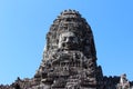 Famous head statues of ancient Bayon temple Royalty Free Stock Photo