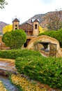 Famous historic Sanctuary of Chimayo with a garden in New Mexico, US Royalty Free Stock Photo