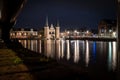 The famous historical `Waterpoort` in the city of Sneek at night with reflections in the canal - Sneek, Friesland, The Netherlan