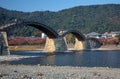 The famous historical wooden arch Kintai Bridge in Iwakuni city in the fall, Japan