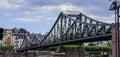 Famous Iron Bridge for pedestrians called Eiserner Steg in the city of Frankfurt - FRANKFURT, GERMANY - JULY 12, 2022 Royalty Free Stock Photo