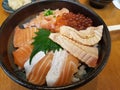 Famous Japanese food Rice with raw salmon slides and salmon eggs