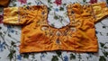 A blouse of famous kanchpuram silk fabrick with Maggam work, one of the most popular type of embroidery.