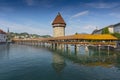 The famous Kapellbrucke Chapel Bridge wooden footbridge across the Reuss River in the city of Lucern, Switzerland