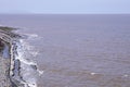 Famous Kilve beach in Somerset England. Summer day. English coast landscape. Horizon line. UK. Rock formations on scenic beach Royalty Free Stock Photo