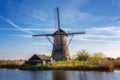 Famous Kinderdijk village of mills, popular tourist attraction in Netherlands Holland, outdoor travel background Royalty Free Stock Photo