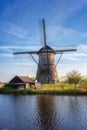 Famous Kinderdijk village of mills, popular tourist attraction in Netherlands Holland, outdoor travel background Royalty Free Stock Photo