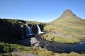 Famous kirkjufell mountain with the kirkjufell falls waterfalls in front in Iceland