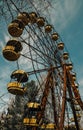 Old ferris wheel in the ghost town of Pripyat. Consequences of the accident at the Chernobil nuclear power plant