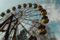 Old ferris wheel in the ghost town of Pripyat. Consequences of the accident at the Chernobil nuclear power plant