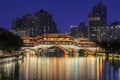 Famous landmark of Chengdu - Anshun bridge over Jin River illuminated at night