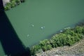 Kayaks gather under famous landmark I. B. Perrine Memorial Bridge Twin Falls Idaho aerial horizontal Royalty Free Stock Photo