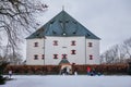 Famous landmark Letohradek Hvezda, renaissance chateau Star Summer Palace with garden and park on the White Hill with snow in