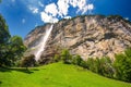 Famous Lauterbrunnen valley with gorgeous waterfall and Swiss Alps