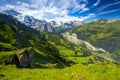 Famous Lauterbrunnen valley with gorgeous waterfall and Swiss Alps