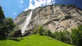 Famous Lauterbrunnen valley with gorgeous waterfall and Swiss Alps in the background, Switzerland, Europe.