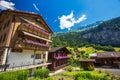 Famous Lauterbrunnen valley with typical house in Swiss Alps
