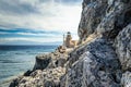 Famous Lighthouse Located on the Castle of Monemvasia Town, Greece. Structure on the Steep Rocks of the Island Royalty Free Stock Photo