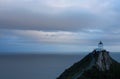 The famous lighthouse and rocks at Nugget Point in the Catlins in the South Island in New Zealand after the sunset Royalty Free Stock Photo