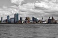 The famous Liverpool Waterfront - The city in colour, the water and sky in black and white. Royalty Free Stock Photo
