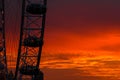 Famous London ferris wheel in city center in sunset time.