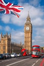 London with red buses against Big Ben in England, UK Royalty Free Stock Photo