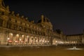 The famous Louvre Palace of Paris at night Royalty Free Stock Photo