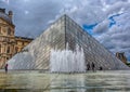 Famous Louvre Pyramid at the Louve at Paris Royalty Free Stock Photo