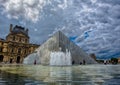 Famous Louvre Pyramid at the Louve at Paris Royalty Free Stock Photo