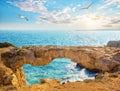 Famous Lovers Bridge or Raven Arch with seagulls in the sky Royalty Free Stock Photo