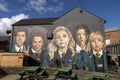 Famous Maiden City mural street art on a building  of Derry girls from comedy TV show  program Royalty Free Stock Photo