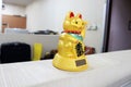 The famous maneki neko statue in Japanese and Chinese culture Royalty Free Stock Photo